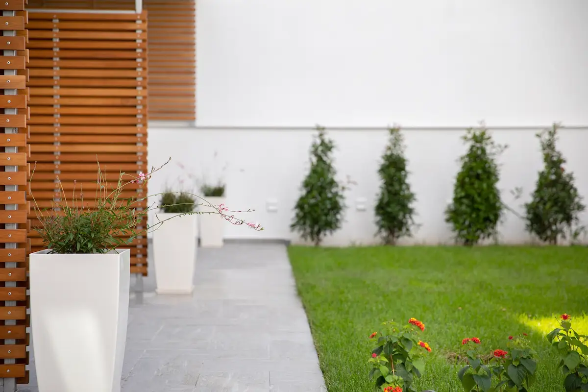 Green courtyard garden at Suites Sole, Keramoti Greece